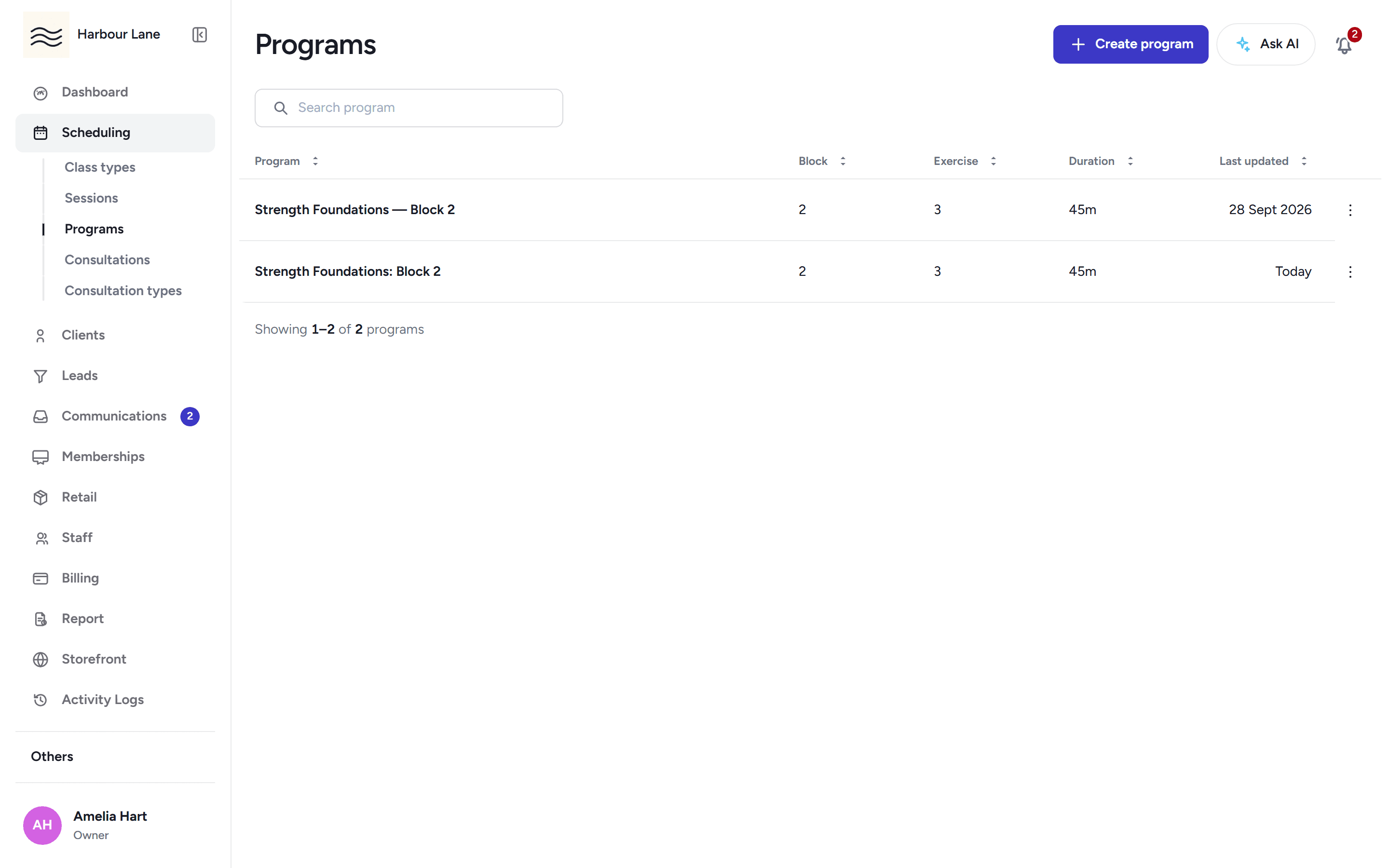 The program builder at Harbour Lane, with a strength block, exercises, sets and coach notes.